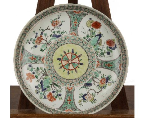 Famille verte dish Chinese, Kangxi period (1662-1722)polychrome, painted with panels of chrysanthemums and other flowers, and