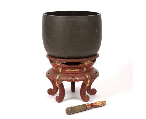 Large temple drumJapanese, circa 1900on a red lacquer and gilt stand, the drum 40.5cm diameter x 28.5cm high with a stick   T