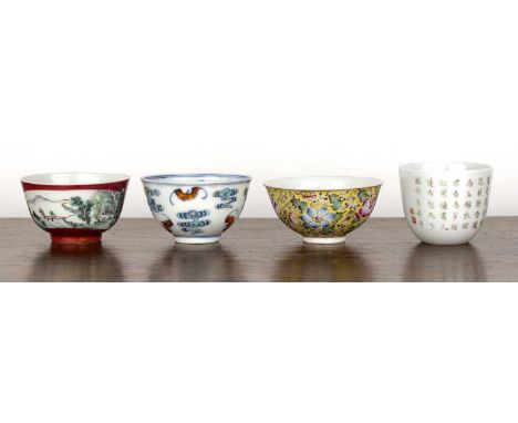 Group of four tea bowlsChineseincluding a yellow enamel bowl with red painted Xuantong mark, diameter, a Doucai bowl painted 