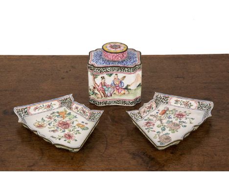 Enamel tea caddyChinese, 19th Centurypainted with scholars, 10cm high, and a pair of enamel hors d'oeuvres dishes, 16cm wide 