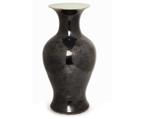Black ground vaseChinese, 18th/19th Centurywith light silvered decoration of birds, blossom and with a ruyi border, 38cm high