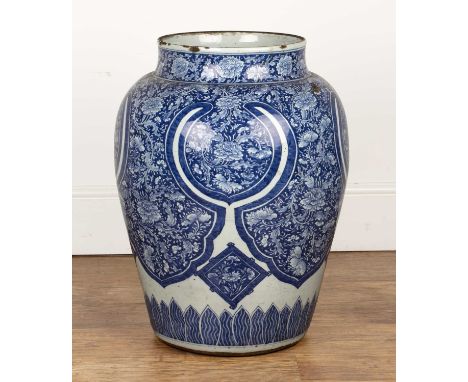 Large blue and white porcelain temple jarChinese, Kangxi period (1662-1722)with panels of foliate designs, within four shaped