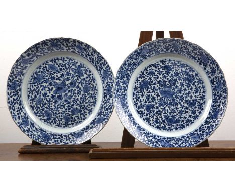 Pair of blue and white porcelain chargersChinese, Kangxi period (1662-1722)each painted with lotus flowers and leaves, each w