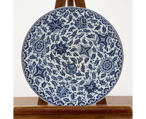 Pair of blue and white porcelain chargersChinese, 19th Centurypainted with stylised lotus and trailing leaves, within ruyi bo