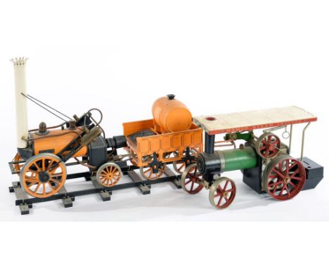 A HORNBY SPIRIT POWERED LIVE STEAM MODEL OF THE ROCKET AND A MAMOD SPIRIT POWERED TRACTION ENGINE 