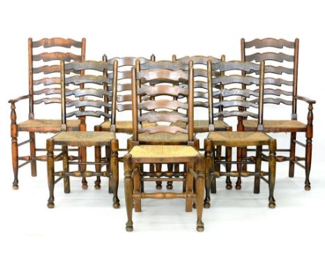 A SET OF EIGHT RUSH SEATED LADDER BACK DINING CHAIRS, INCLUDING TWO ELBOW CHAIRS