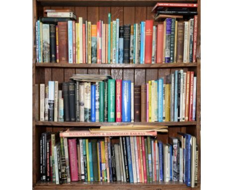 THREE SHELVES OF BOOKS RELATING TO RAILWAYS, INCLUDING WILLIAMS - THE MIDLAND RAILWAY 1878, SEKON - HISTORY OF THE G. W. R. 1