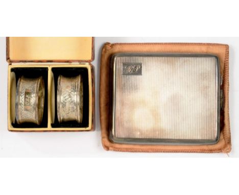 A GEORGE VI SILVER CIGARETTE CASE, ENGINE TURNED, 10CM, BIRMINGHAM 1950 AND A PAIR OF SILVER NAPKIN RINGS, 5OZS 3DWTS 
