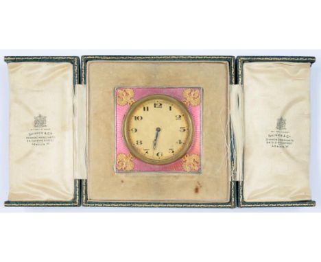 A SILVER COLOURED METAL AND PINK GUILLOCHE ENAMEL STRUT TIMEPIECE, THE CORNERS APPLIED WITH GILTMETAL DOUBLE HEADED EAGLE, 6.