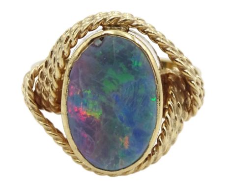 Gold oval opal doublet ring with rope twist design gallery, stamped 9ctCondition Report:Approx 4.1gm, size N, max depth = 17m