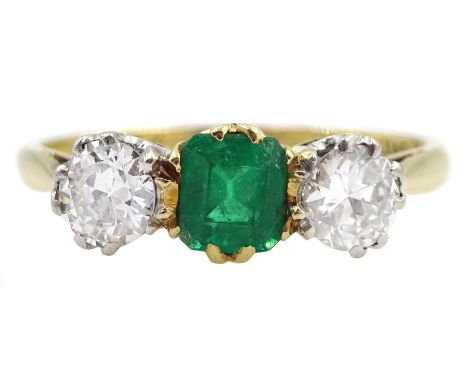 Early 20th century gold three stone old cut diamond and emerald ring, stamped 18ct Plat, the inside initialled and dated 24.7