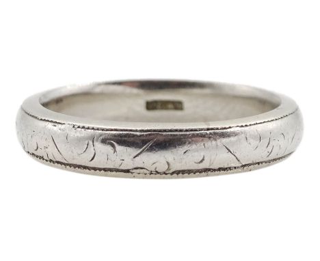 Platinum wedding band with engraved decoration, stamped PlatCondition Report:Approx 5.5gm, size K, band depth = 3mm 