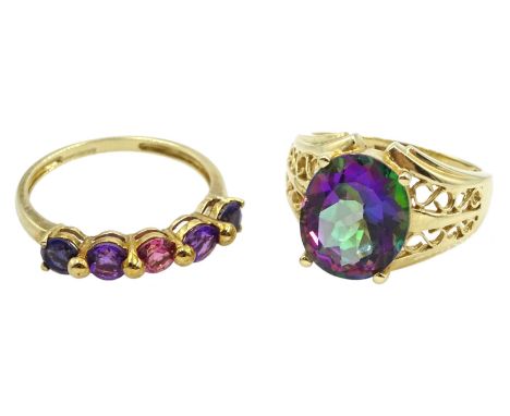 Gold oval mystic topaz ring with pierced shoulders and a gold five stone iolite, pink topaz and amethyst ring, both hallmarke