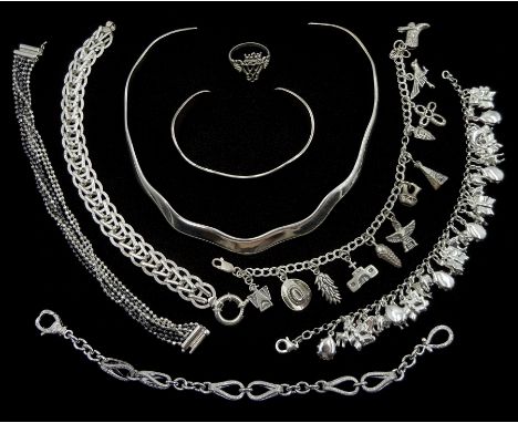 Silver jewellery including torque necklace and similar bangle, two charm bracelets, three link bracelets and a ring, all stam