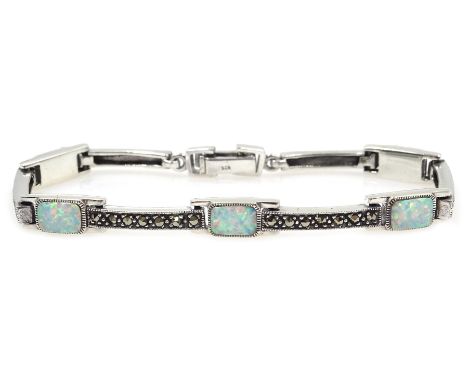 Silver opal and marcasite link bracelet, stamped 925Condition Report:Length = 18.3cm, good condition