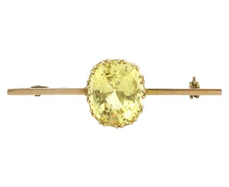 Natural cushion cut yellow sapphire gold bar brooch, stamped 9ct, the sapphire of approx 16mm x 13.35mm x 9.82mmCondition Rep