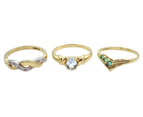 Gold single stone blue topaz ring, gold diamond crossover ring and a three stone emerald wishbone ring, all hallmarked 9ctCon