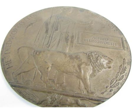 A First World War memorial / death plaque for Alfred Ellingworth.