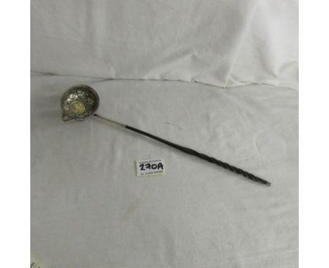A Victorian sauce ladle with inset Victorian coin.