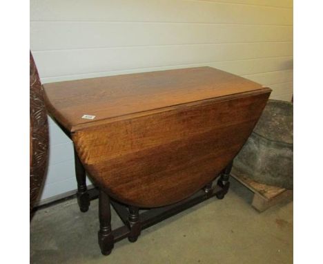 An oak gate leg table.