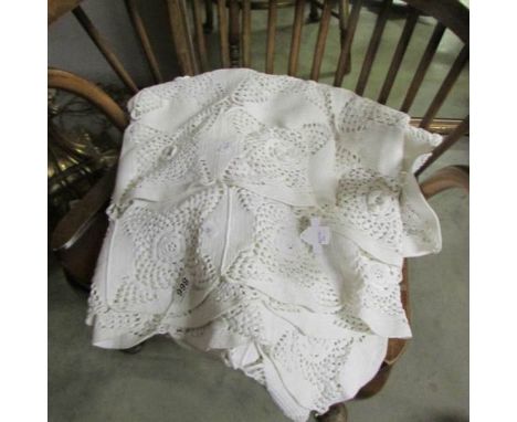 A Vintage Irish rose crocheted bed spread in cotton.