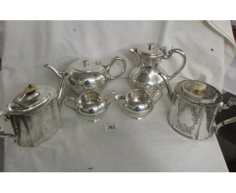 A 4 piece Walker &amp; Hall silver plate tea service and 2 silver plate teapots.