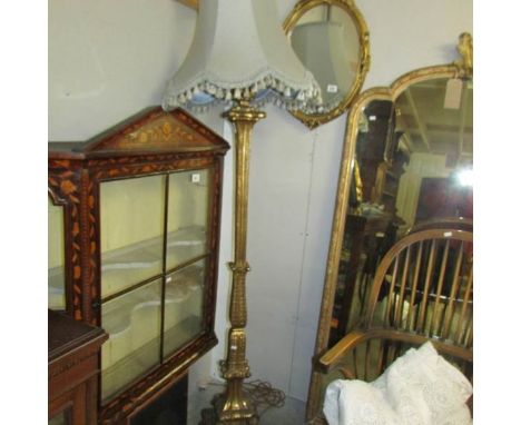 A 19th century gilt wood standard lamp.