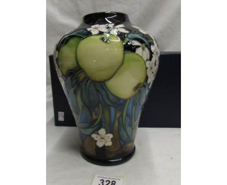 A Moorcroft limited edition vase 'The Codling', 26/50, signed E. Bossoms, with box (approximately 23 cm tall, first quality).