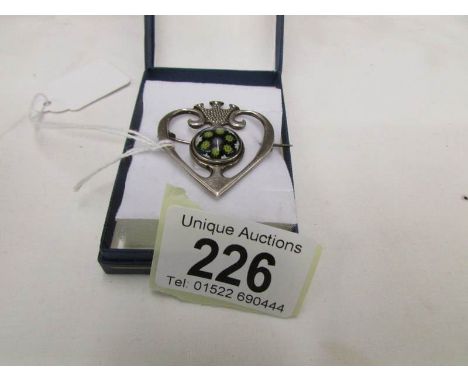 A Scottish silver brooch with millefiori inset fashioned as a heart, Edinburgh 1972, Caithness Jewellery.
