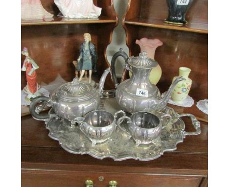 A 4 piece silver plate tea set on tray.