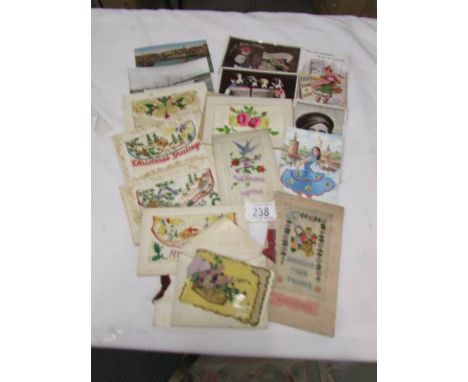 A selection of First World War silks and other postcards.