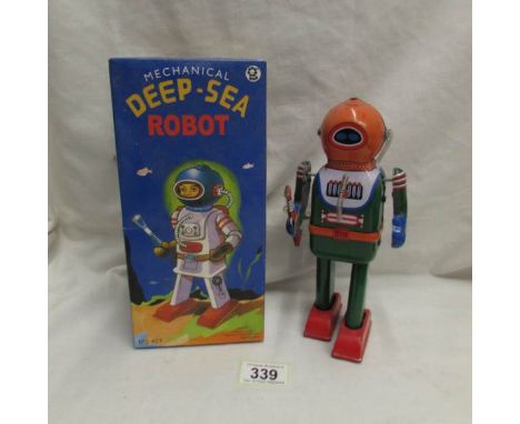 A tinplate clockwork Deep-Sea robot in box.