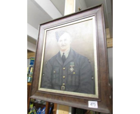 An oak framed portrait painting by J. H. Speechley of an R.A.F. aircraftman wearing the George Cross (probably AC1 Vivian 'Bo
