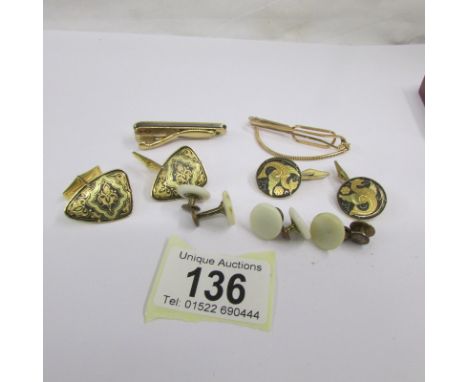 A collection of vintage cuff links, tie pins, collar studs etc. (12 items in total).