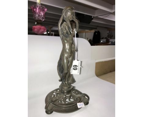 A WMF Art Nouveau girl candlestick. ****Condition report**** Good condition with no significant damage observed.It is made of