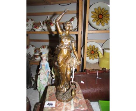 A French pink marble mantel clock surmounted figure. ****Condition report**** Springs in good orderIn working order