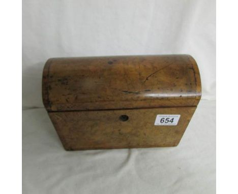 A Victorian walnut domed top tea caddy.