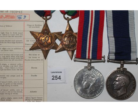 A PACIFIC STAR-LSGC R NAVY POW GROUP OF FOUR MEDALS. A 1939/45 & Pacific Stars, War Medal and Long Service Good Conduct Medal