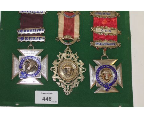 FRAMED RAOB MEDALS. The first a silver and enamel with jewel eyes Midlands County Banner on the bars. Buffalo head centre wit