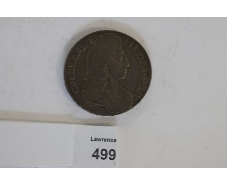 A WILLIAM 111 CROWN PIECE. A William 111 Crown piece with first type harp and octavo in the edge lettering. 169-5 or 6 unclea