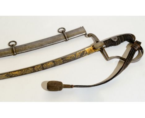 A BLUE & GILT GERMAN CAVALRY SWORD. An Imperial German Cavalry sword with gilt and darkened decoration, makers mark W KC and 