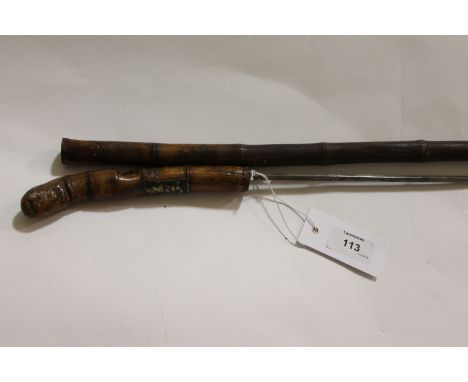 A SWORDSTICK. A cane swordstick or dagger, with short stabbing 10.1/2" blade of diamond form.