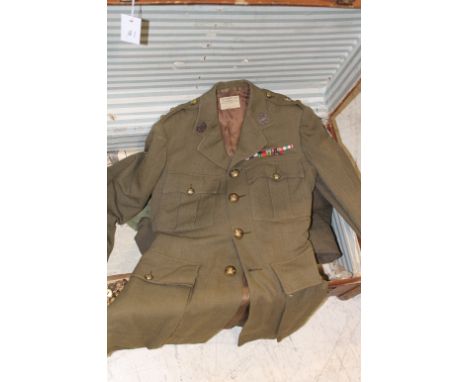 A WARTIME R TANK REGT OFFICERS UNIFORM. A 1942 dated Royal Tank Regiment officers tunic, with label Flight Ltd Camberley. Com