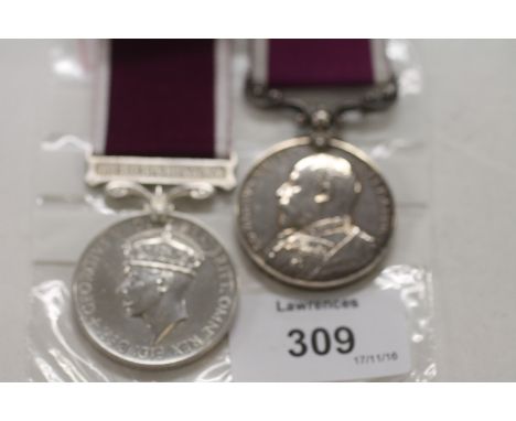 TWO LONG SERVICE GOOD CONDUCT MEDALS. An Edward V11 issue Long Service Good Conduct Medal, awarded to 162 BQM Sjt C J Browne.