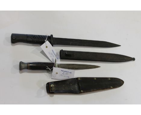 A GERMAN BAYONET &amp; ROGERS KNIFEA K98 Bayonet with darkened blade with 37 on the spine J.Sch makers mark, complete with a 