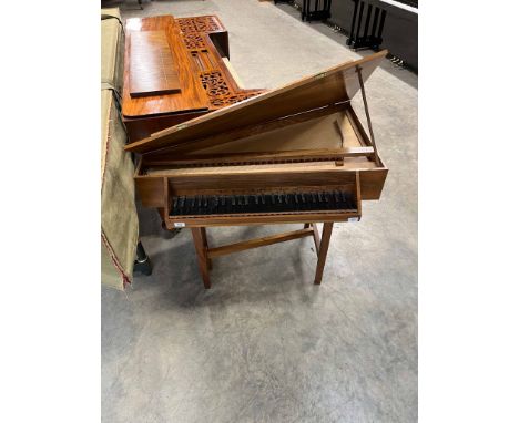 Alan Savage (c1977) A spinet in a walnut case. There is VAT on this Lot.A condition report for this Lot will be available on 