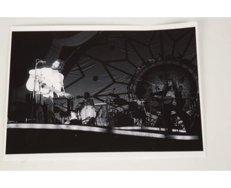 CAT STEVENS: Three sets of negatives, Cat Stevens playing in concert.