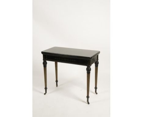 GILLOWS OF LANCASTER: AN AESTHETIC PERIOD EBONISED AND GILT INCISED CARD TABLE, the rectangular top with moulded border above