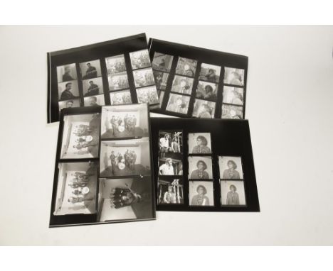 ALEXIS KORNER: A large collection of negatives and contact sheets of Alexis Korner posed with other musicians, playing the gu
