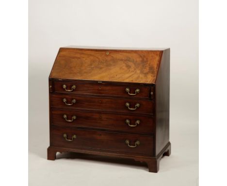 A GEORGE III MAHOGANY BUREAU, the sloping crossbanded fall enclosing a fitted interior, with a central door inlaid with a sce